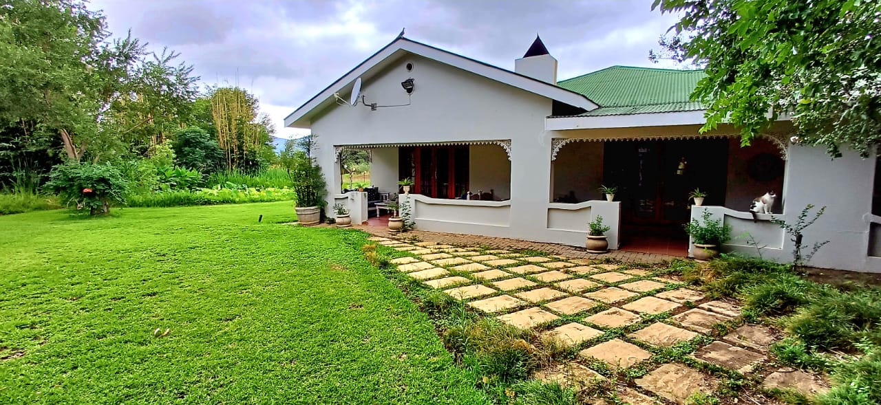 House among gardens