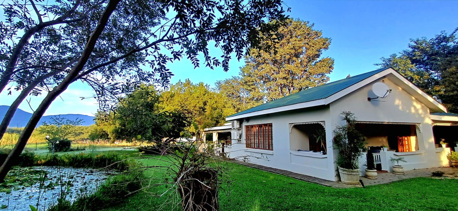 Lodge beside water garden